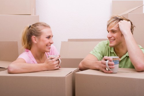 Packed moving boxes and furniture ready for house removals in Hanwell