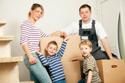 Local moving van helping with loading in Hanwell