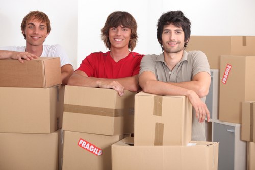 Local man and van moving furniture in Hanwell residential street