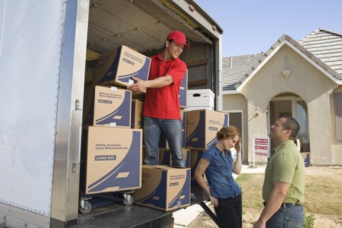 Careful furniture handling during a house move in Hanwell