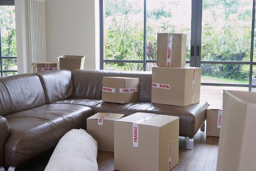 Furniture and boxes being loaded into a removal van in Hanwell