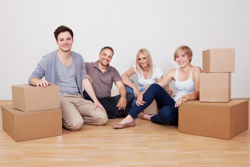 Removal truck loading furniture and boxes for a west London move